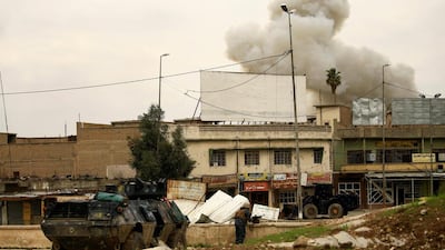 Smoke rises during clashes between Iraqi forces and ISIL militants in Mosul, Iraq on March 19, 2017. Thaier Al Sudani/Reuters