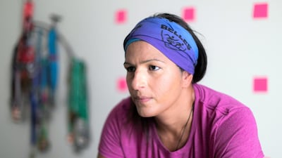 Melina Timson-Katchis, a triathlete, finds it hard to exercise after getting all clear from Covid-19. Reem Mohammed / The National