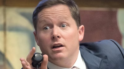 Auctioneer Ralph Taylor of Bonham's Auctioneers, London, sells works of art.