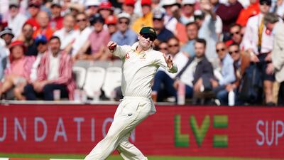 Australia's Steve Smith takes a catch on the boundary rope to dismiss England's Ollie Pope for 42. PA