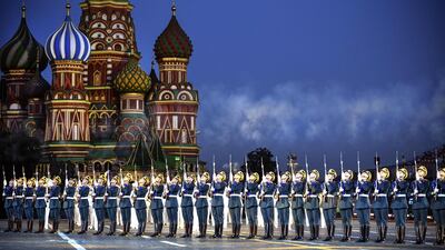 Russian honour guards perform during the 'Spasskaya Tower' international military and music festival on the Red Square. AFP