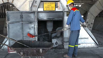 High voltage electricity is continuously pumped into the smelters or pots below to product molten aluminium