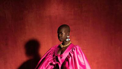 A raspberry satin dress by Osman Yousefzada for autumn / winter 2021