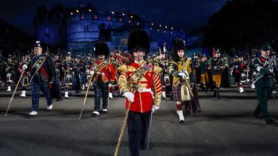 The massed pipes and drums during a working rehearsal for the first full run-through of the Royal Edinburgh Military Tattoo in Scotland. Getty Images