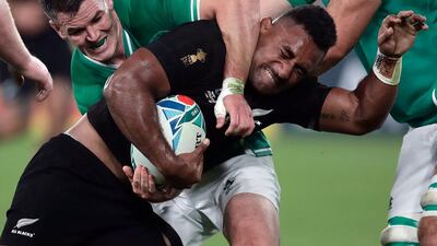 New Zealand's Sevu Reece is defended by Ireland's Johnny Sexton during the Rugby World Cup quarterfinal match at Tokyo Stadium between New Zealand and Ireland in Tokyo, Japan. AP Photo