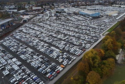 New cars for export in Essen, western Germany. The OECD has downgraded its growth outlook for Europe's top economy. AFP