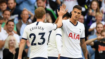 Erik Lamela celebrates with Danish midfielder Christian Eriksen after scoring Tottenham's fourth goal. AFP