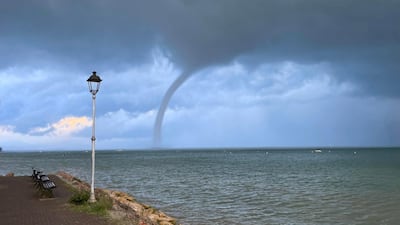 A tornado over the Veronese part of Lake Garda, northern Italy. Although such tornados occur mostly in tropical and subtropical areas they are also possible under certain weather conditions over larger lakes and standing waters in Europe and other parts of the globe. EPA