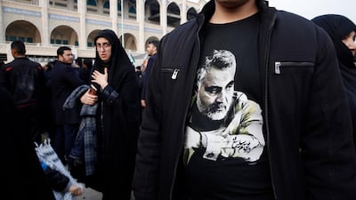 A man wearing a T-shirt with a picture of Suleimani takes part in an anti-US demonstration in Tehran. EPA