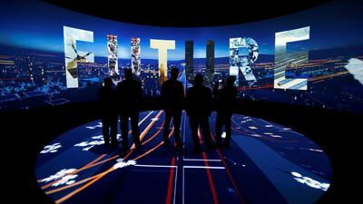 Visitors watch a 3D presentation during an exhibition on 'NEOM', a new business and industrial city, in Riyadh, Saudi Arabia, on October 25, 2017. Reuters