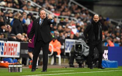 Rafa Benitez, left, could be happy with Newcastle United's efforts in their loss to Manchester City. Stu Forster / Getty Images
