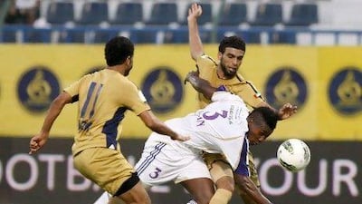 Al Ain, with Asamoah Gyan, centre, are aiming for their 10th league title.