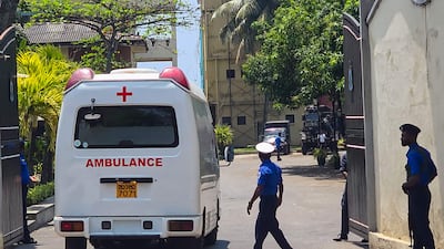 An ambulance enters Sri Lanka's southern naval headquarters in Galle on March 4, 2026, to pick up Iranian sailors rescued from an Iranian ship near the island earlier in the day. AFP