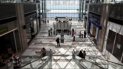 Customers enjoy the opening day at The Galleria in August, checking out the stores and shopping at the brand new luxury mall at Sowwah Square on Al Maryah Island in Abu Dhabi. Silvia Razgova / The National