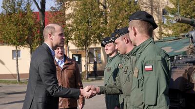 Prince William and Mr Blaszczak during a visit to the base, which has been heavily involved in providing support to Ukraine. Getty