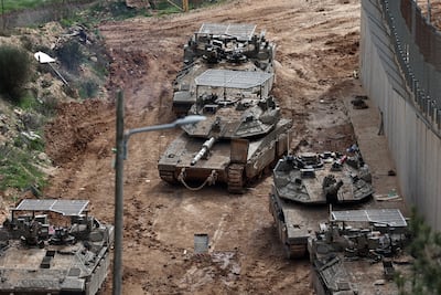 Israeli tanks move into next to the Lebanese border as troops advance. EPA