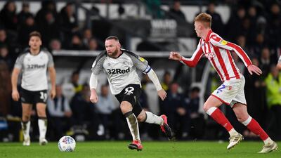 Wayne Rooney runs at ther Stoke defence. Getty