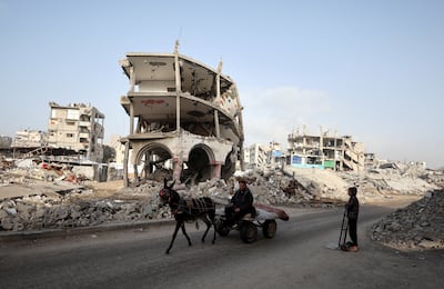 Destruction in Gaza city. Israel's government has been accused of weaponising aid and impeding the work of humanitarian groups in the Palestinian enclave. Reuters