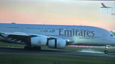The Emirates jet lands safely after being forced to circle for 90 minutes over London while a fault was checked. Photo: Screengrab from Big Jet TV