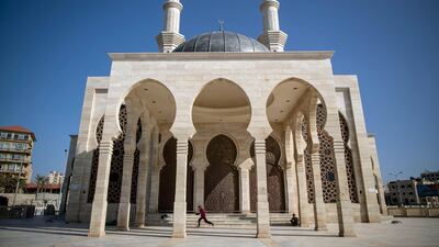 Palestinian children play outside a mosque closed as part of measures to stop the spread of the coronavirus during a Ramadan day in Gaza City. AP Photo