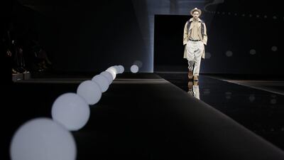 A model walks down the catwalk as part of Giorgio Armani men’s Spring-Summer 2016-2017 collection in Milan. Luca Bruno / AP Photo