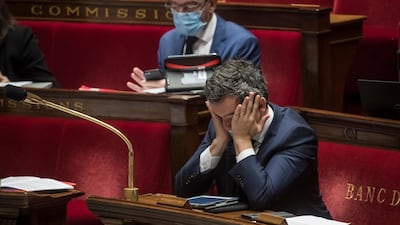 epa08830744 French Interior Minister Gerald Darmanin (C) attends a session at the National Assembly during a debate on the bill 'Loi de Securite Globale' (Global Security Law) in Paris, France, 20 November 2020. A draft global security legislation presented to the French Parliament creates controversy. Critics have warned that the proposed bill would be a danger to press freedom, including the requirement to blur the faces of police officers on duty. EPA/CHRISTOPHE PETIT TESSON