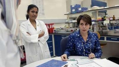 Dr Lihadh al Gazali, right, in a laboratory at the UAE University Faculty of Medicine and Health Sciences. She has done pioneering work on consanguinity among the Emirati population.