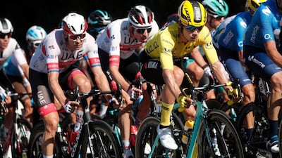 Team Jumbo-Visma rider Primoz Roglic wearing the yellow jersey. Reuters