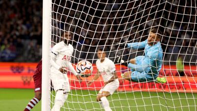 Tottenham goalkeeper Guglielmo Vicario looks on after Divin Mubam's header hits the back of the net to make it 2-0. EPA