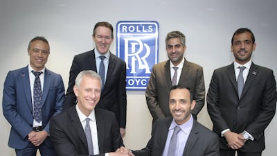 Khaled al Qubaisi, CEO Aerospace, Renewables & ICT at Mubadala and Dominic Horwood, Rolls-Royce, Chief Customer Officer - Civil Aerospace, sign a $6.5bn engine maintenance contract.