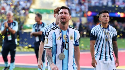 Argentina's Lionel Messi with the runners-up medal at the end of the Fifa World Cup final in New Jersey. Reuters
