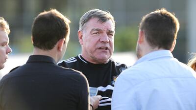 West Ham United manager Sam Allardyce, centre, is hoping to spoil things for Manchester City and give Liverpool the title because he says long-time Red Steven Gerrard deserves one. Jaime Puebla / The National