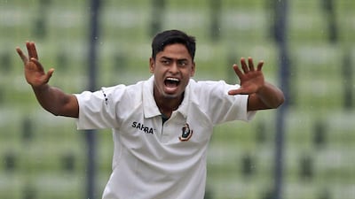 Bangladesh spinner Taijul Islam celebrates a successful LBW appeal on Monday during the third and final day of the first Test against Zimbabwe. AM Ahad / AP / October 27, 2014
