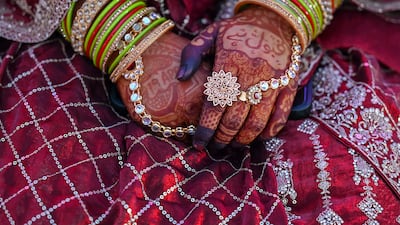 A Muslim bride waits to get married during a mass wedding ceremony in Mumbai. AFP