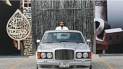 Charlie Pocock stands outside the Meem Gallery in Dubai with his 1991 Bentley Turbo R. Mr Pocock came about the British classic in somewhat unusual circumstances.