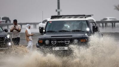 Roads in Sharjah were inundated with water after Sunday's heavy rain. AFP