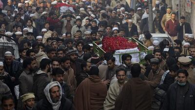 People attend funeral of a student killed in Tuesday's Taliban attack. Mohammad Sajjad / AP Photo