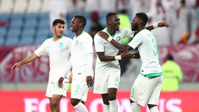 Saudi Arabia players celebrate after beating Qatar in the Gulf Cup semi-finals. Reuters