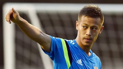 Keisuke Honda shown during a training session in Brazil on Sunday. Toshifumi Kitamura / AFP / June 8, 2014