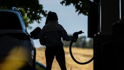 A driver refuels her car in Hercules, California. The US average retail price of regular-grade petrol rose in the past two weeks amid the Israel-Iran war. Bloomberg