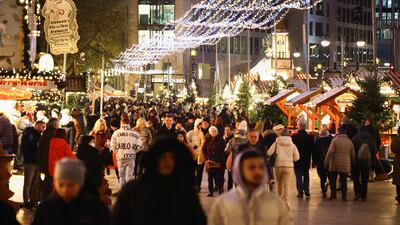 People visit the Breitscheid Square market in Berlin. Reuters