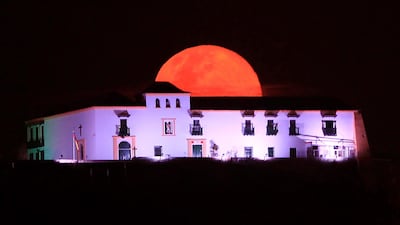 A view of the super moon, above the Convent of Santa Cruz de la Popa, in Cartagena, Colombia. EPA
