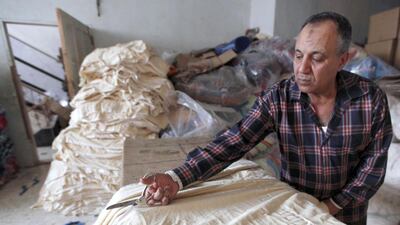 Egypt’s new prime minister Ibrahim Mahlab urged an end to labour strikes and protests, which are straining the economy. Above, a worker at a textile mill in Mahalla El Kubra, north of Cairo. Mohamed Abd El Ghany / Reuters