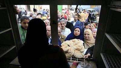 Egypt's economic troubles have worsened since the revolution that overthrew Hosni Mubarak in February last year. Cairo is in talks with the IMF for some much-needed funds. Amr Nabil / AP Photo