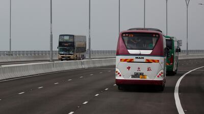 Buses drive on the Hong Kong-Zhuhai-Macau Bridge.Reuters