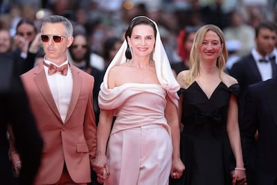 Cannes Film Festival jury president Juliette Binoche, pictured with jurors Jeremy Strong and Alba Rohrwacher, added her name to a protest letter after facing a backlash AFP
