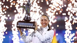 DUBAI, UNITED ARAB EMIRATES - FEBRUARY 21: Jessica Pegula of United States poses with the trophy after victory over Elina Svitolina of Ukraine in the Women’s Singles Final match during day seven of the Dubai Duty Free Tennis Championships, part of the Hologic WTA Tour at Dubai Duty Free Tennis Stadium on February 21, 2026 in Dubai, United Arab Emirates. (Photo by Francois Nel / Getty Images)