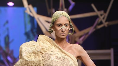 A model walks the runway at the Amato spring / summer 2020 show during Fashion Forward Dubai on November 02, 2019. Getty Images