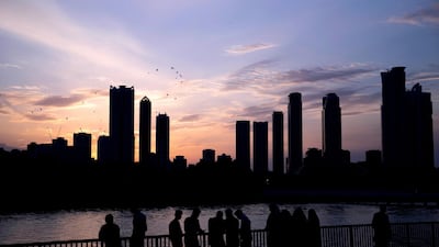 Sharjah's high rise skyline at dusk. Parental negligence is under scrutiny after a series of tragedies involving fells from balconies and windows. Reem Mohammed / The National