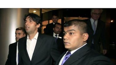 Mohammad Asif, second from right, was one of three Pakistan cricket players to be banned for allegedly bowling no-balls at the Lord's Test last year.